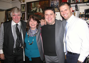 James with his wife Elaine and son Michael Pendlebury, along with a long term suit customer.